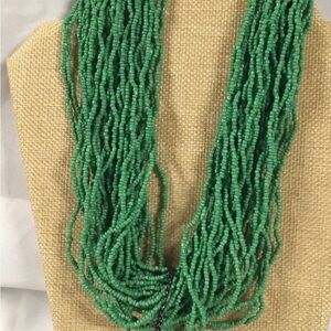 Jerollin multi strand seed bead choker necklace. Extends to 20 “